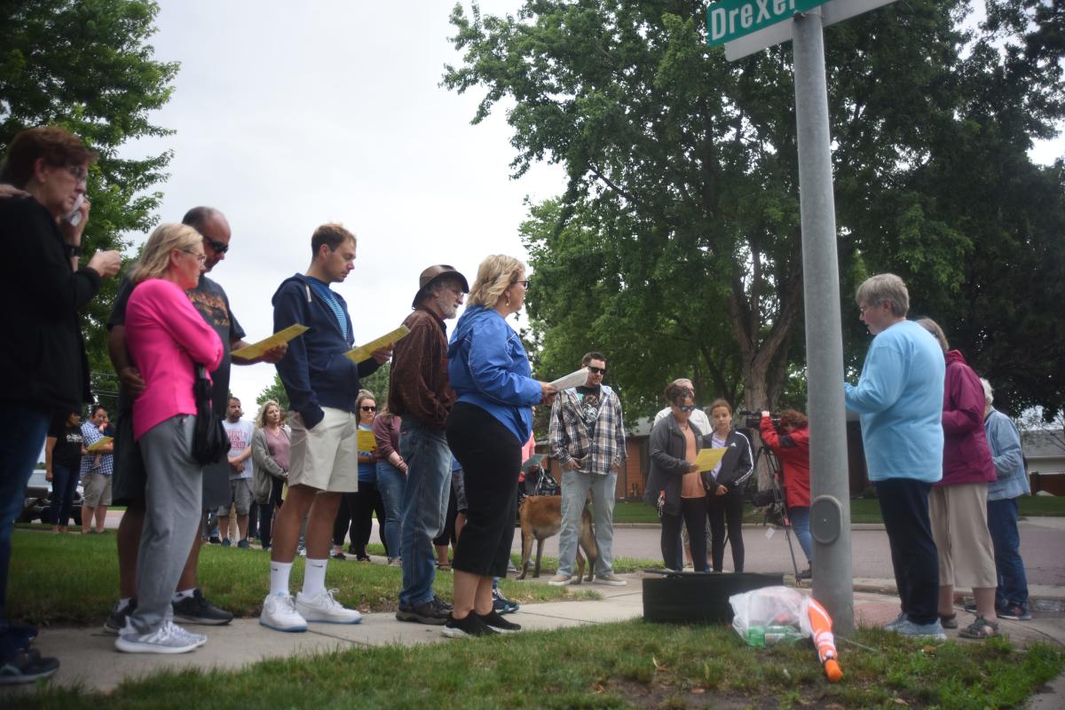 Dozens attend vigil to remember victims of Sioux Falls triple homicide