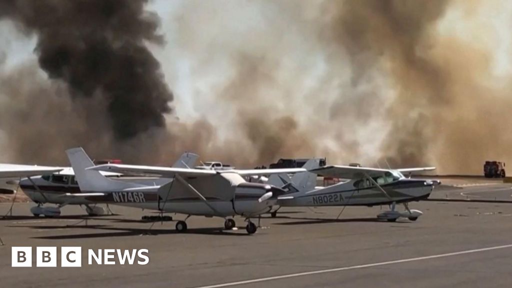 California airport engulfed by wildfires
