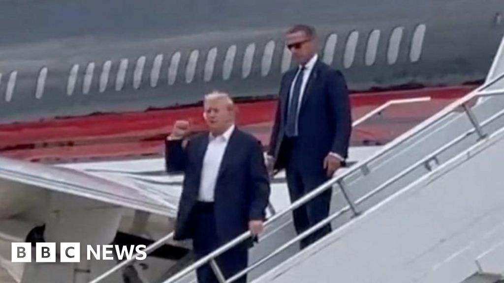 Watch: Trump raises fist as he arrives in Milwaukee for convention