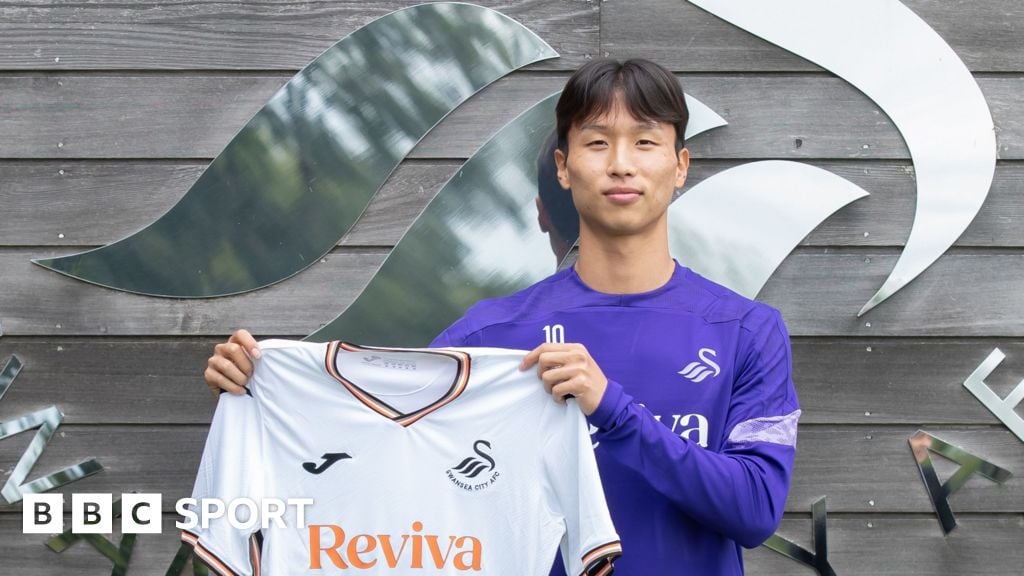 Swansea sign Eom on four-year deal