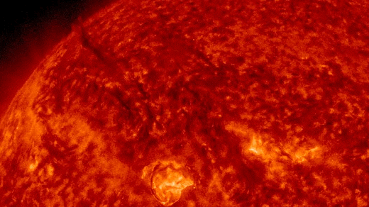 Watch two plumes of 'dark' plasma explode from the sun and send solar storm towards Earth (video)