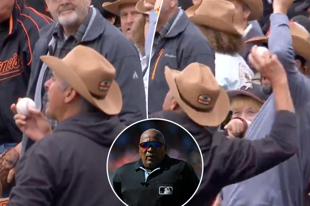 Giants fan ejected for throwing foul ball at umpire Laz Diaz