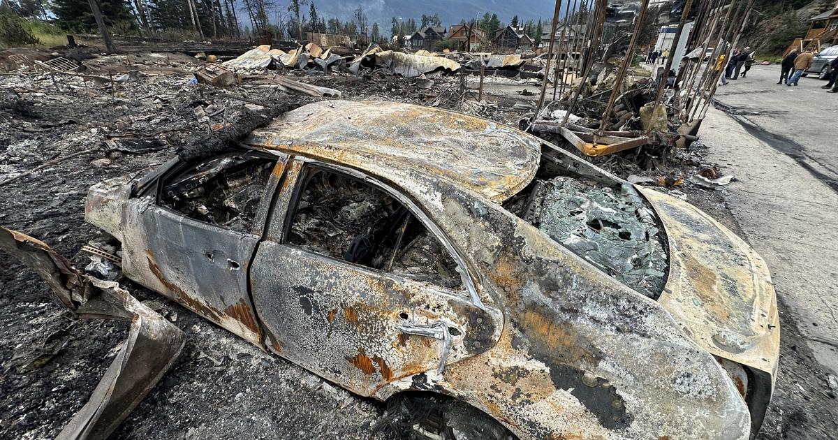 Jasper National Park's largest wildfire in a century destroys a third of Canadian town - and could continue for months