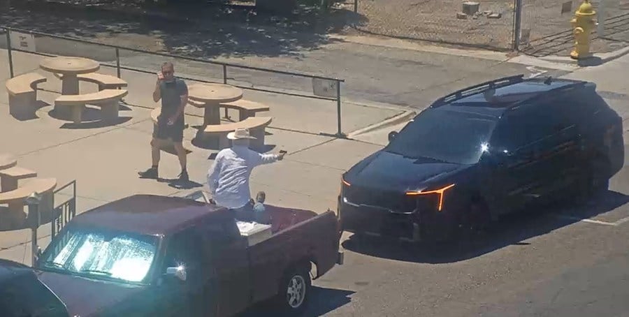 VIDEO: Black SUV nearly hits group with anti-Trump signs in Nob Hill