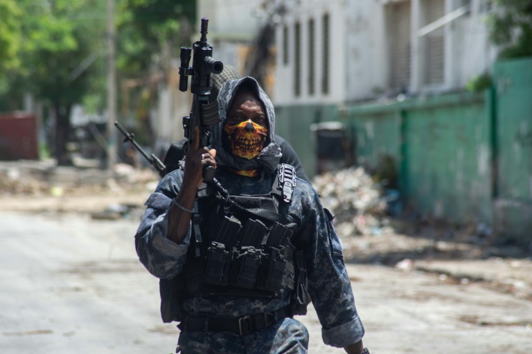 AP PHOTOS: In documenting violence in Haiti, you find bodies, but also ways people keep on living