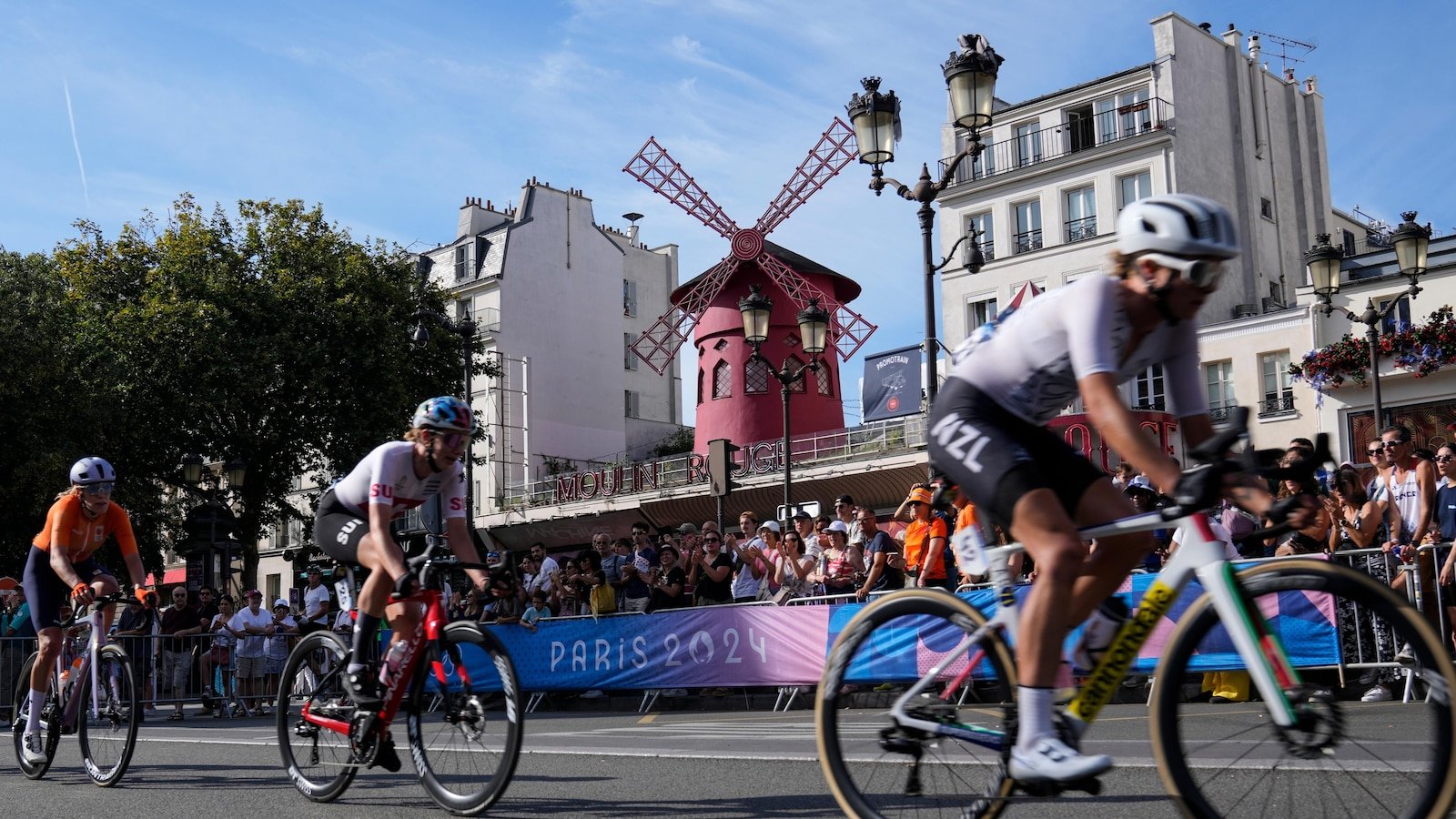 US rider Kristen Faulkner sprints clear to win women's road race at Paris Olympics