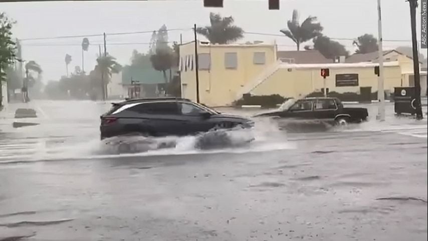 Tropical Storm Debby swirls over Atlantic, still dumping rain on the Carolinas before moving north