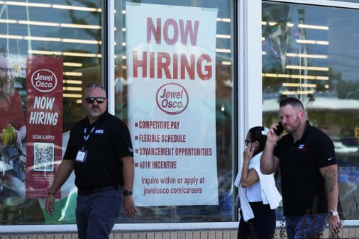 Fewer Americans filed for jobless benefits last week, but applications remain slightly elevated