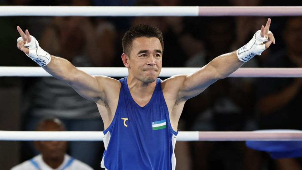 Uzbekistan's Dusmatov wins men's flyweight gold