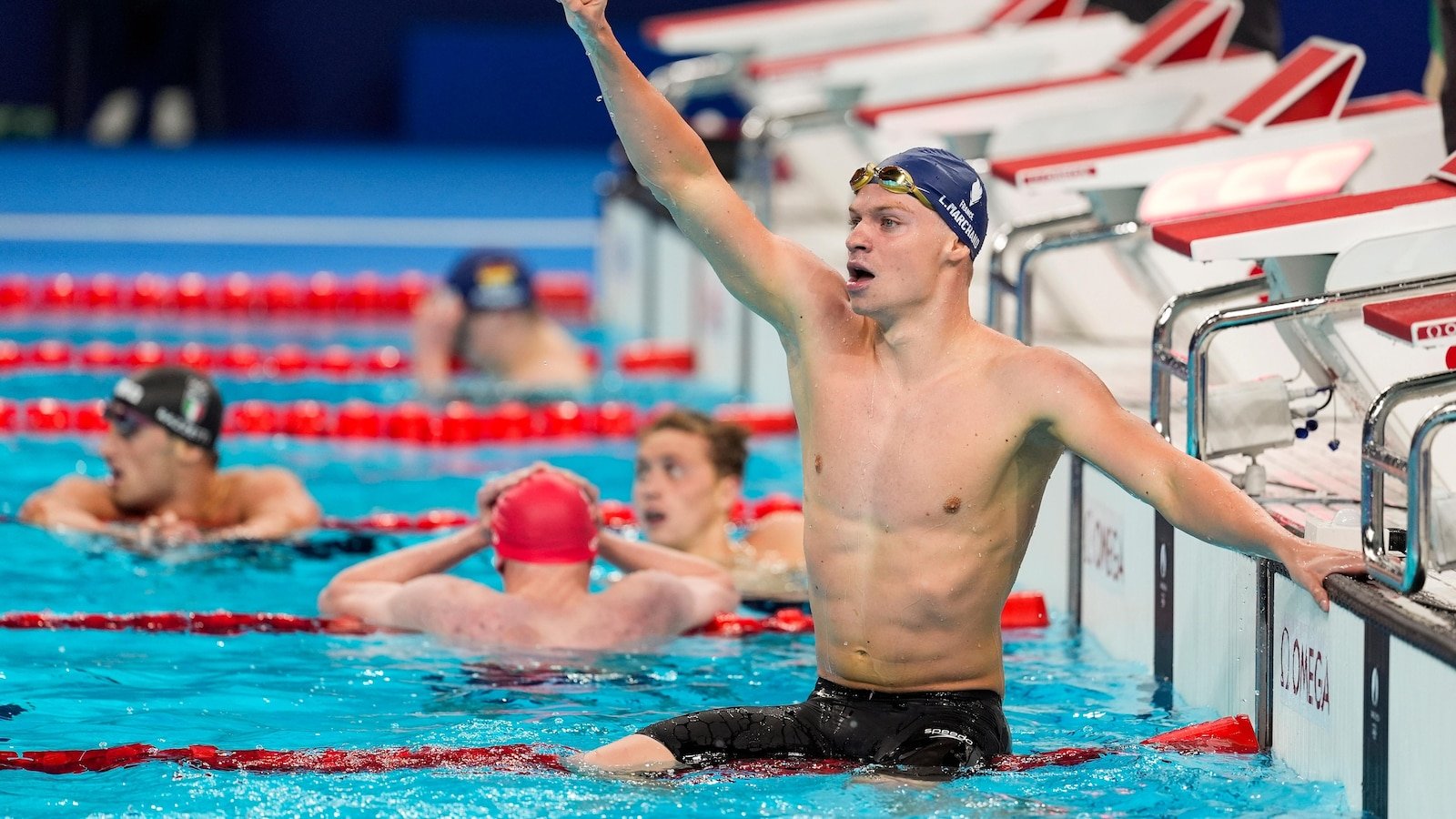 Longtime Phelps coach Bob Bowman was in tears watching new star pupil Leon Marchand win gold