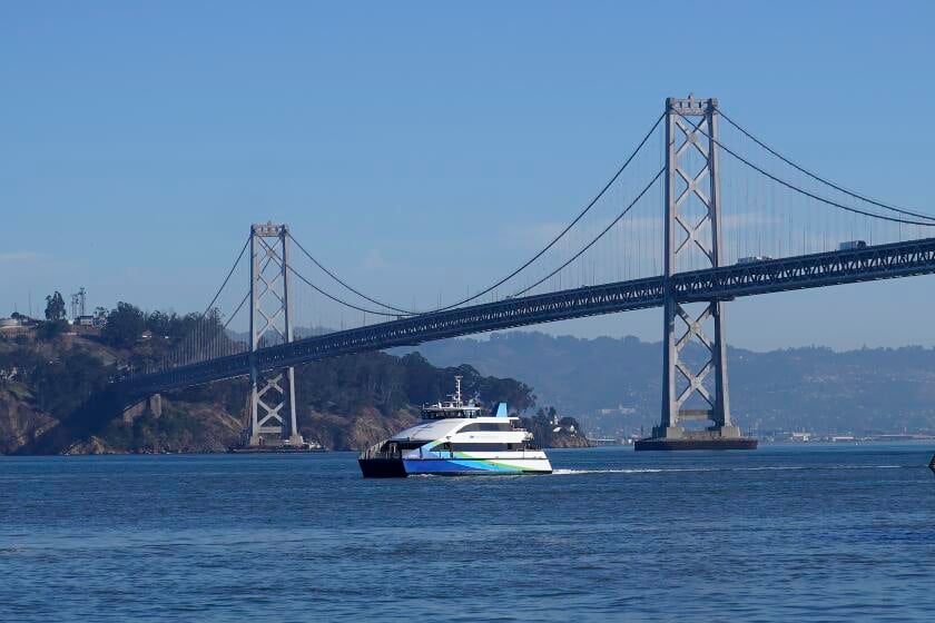 Driver fleeing car collision on Bay Bridge jumps off railing, and survives