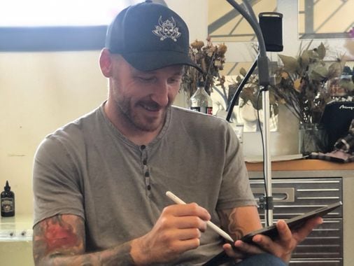 Rhode Island's Mark Wade inks tattoos like watercolors