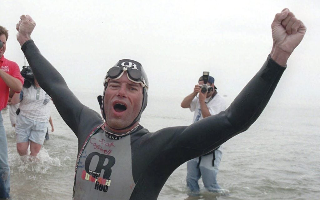 Marathon swimmer says he quit his trek across Lake Michigan after going in wrong direction without a working GPS