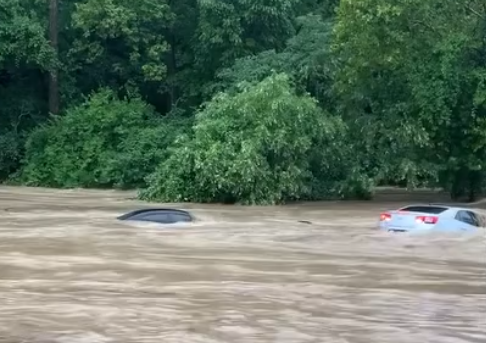 WATCH: Flooding forces cars underwater near Manchester