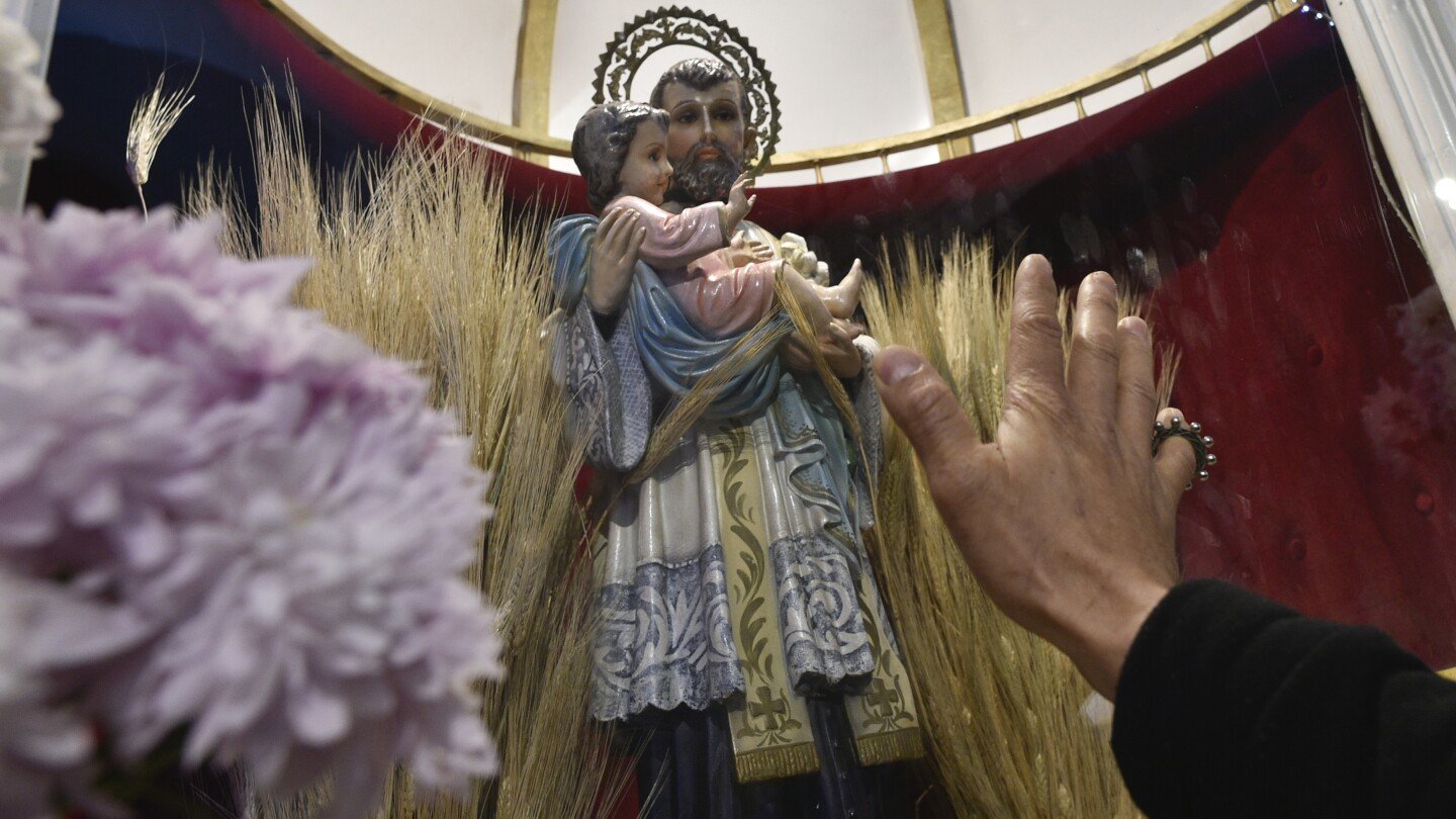 As President Milei's austerity hits hard, jobless Argentines appeal to the patron saint of work