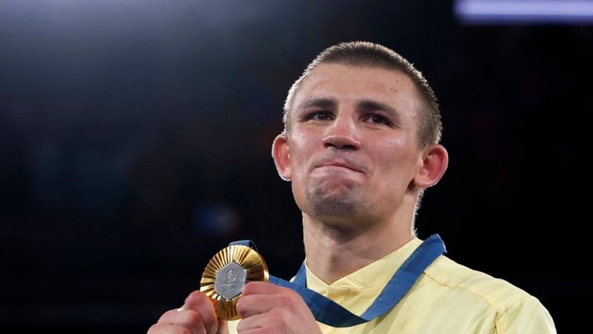 Ukraine's Khyzhniak wins middleweight gold