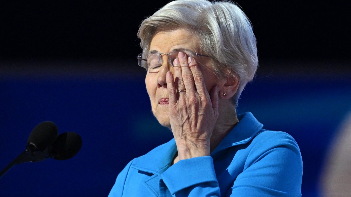 A visibly emotional Elizabeth Warren says Harris will protect Americans