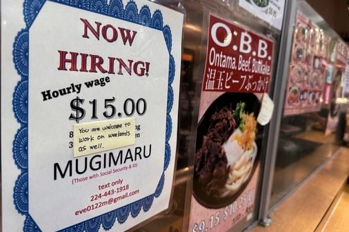 Applications for US jobless benefits fall to 2-month low as layoffs remain at healthy levels