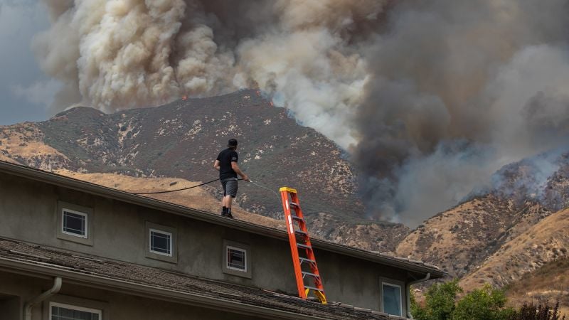 Line Fire: Residents flee as California and Nevada wildfires grow and forecasters warn of record heat this week