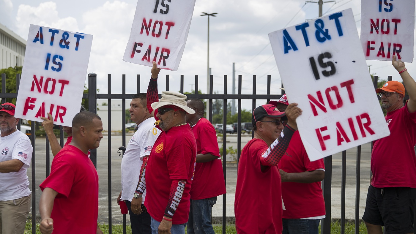 17,000 AT&T workers have been on strike for three weeks. Here's why.