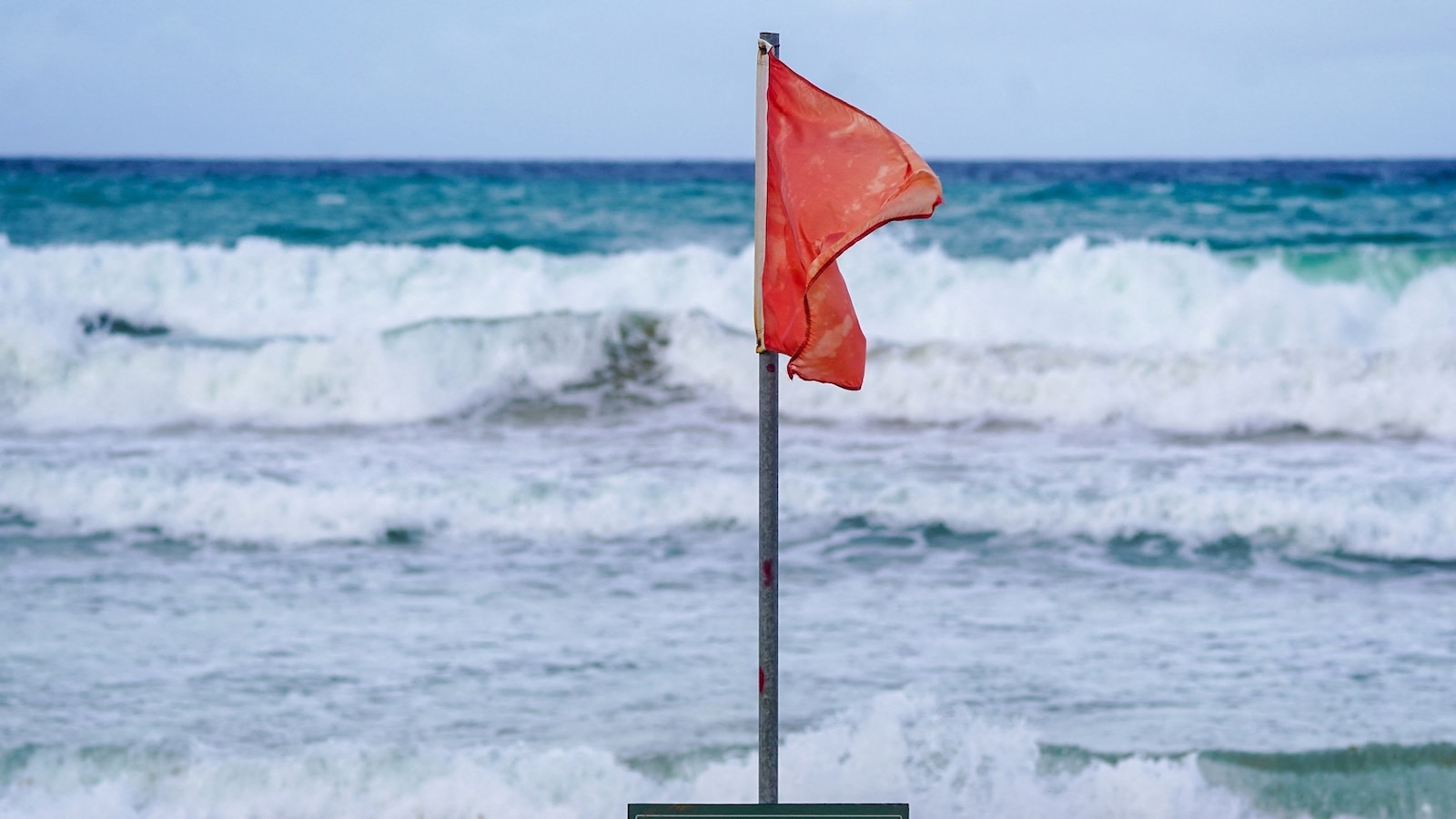 Tropical Storm Ernesto's winds strengthen to near-hurricane force