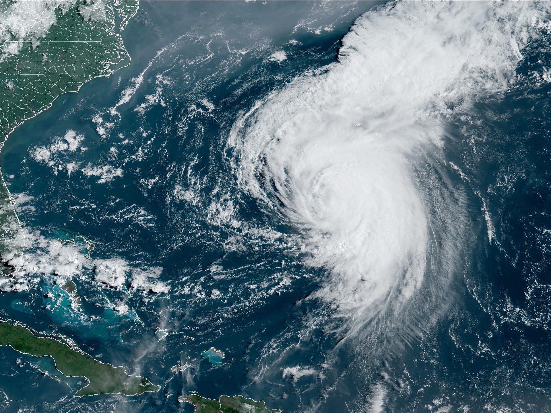 Hurricane Ernesto makes landfall in Bermuda as residents hunker down