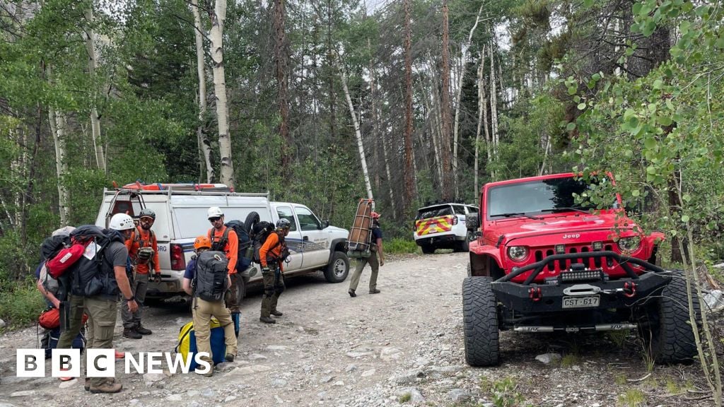 Hiker rescued after workmates left him on mountain, says search crew