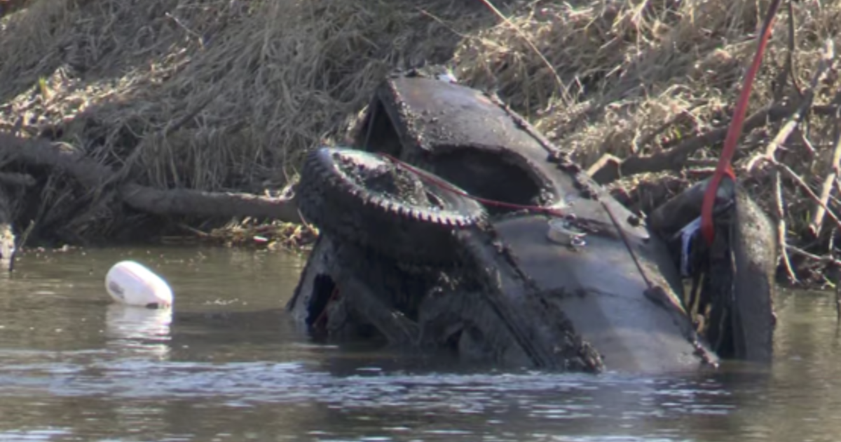 Skeletal remains inside car found by fishermen in Illinois river identified as men who disappeared in 1976