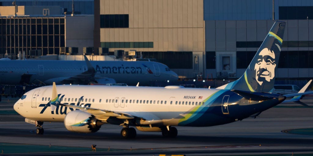 4 Alaska Airlines flight attendants were taken to hospital after reporting an 'unidentifiable odor' that caused plane to divert