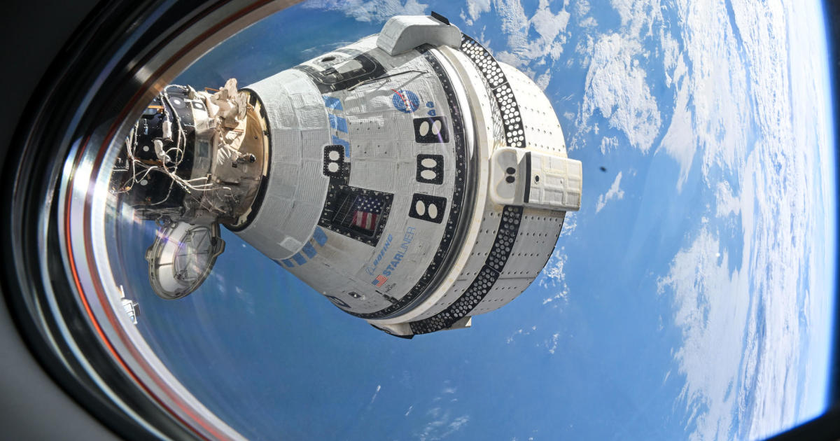 Boeing Starliner, leaving its crew behind, lands in New Mexico