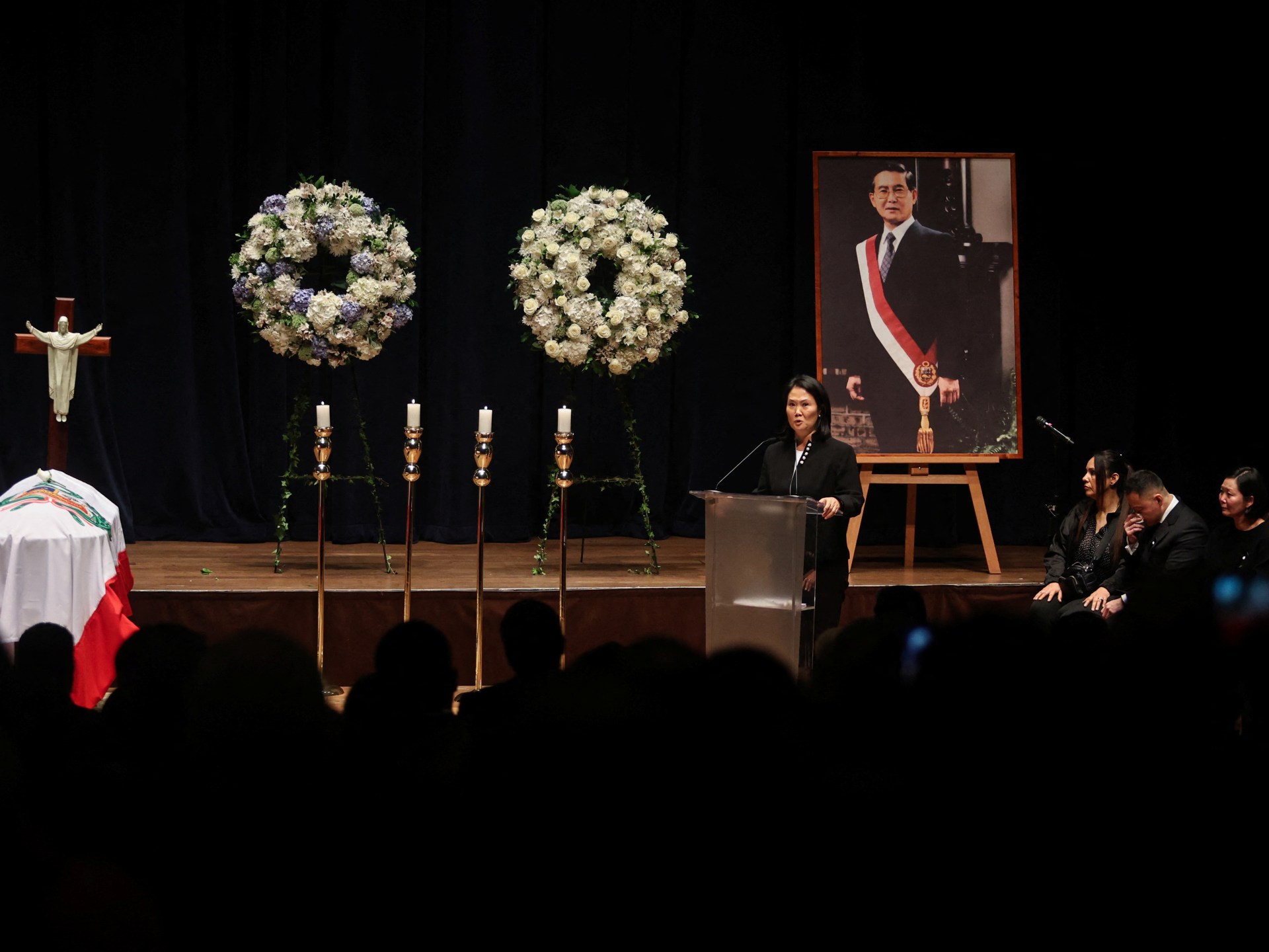 Peru holds funeral for Fujimori, former president linked to rights abuses