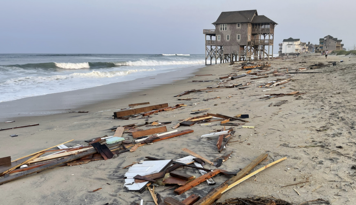 Outer Banks home falls into the ocean, highlighting a grim trend. See the photos.