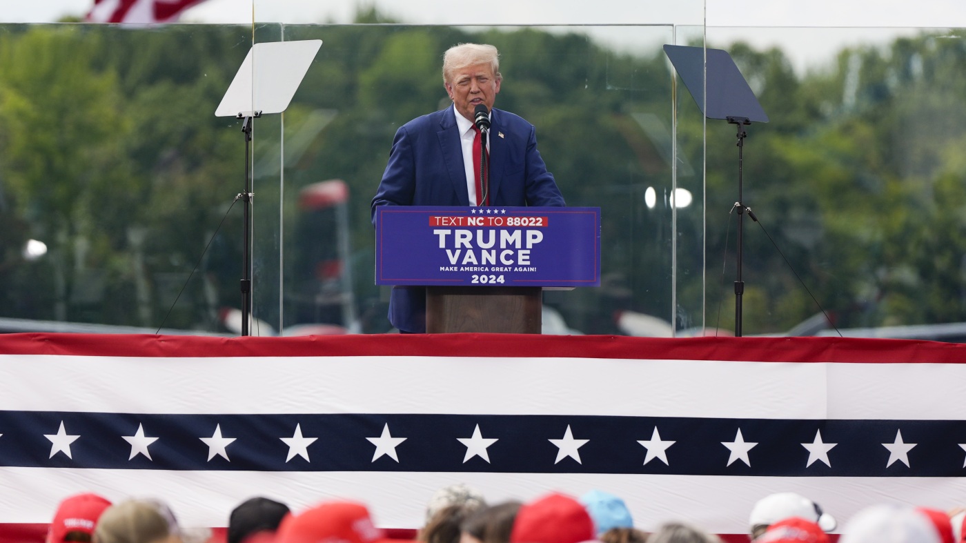 Trump speaks behind bulletproof glass at 1st outdoor rally since attempted assassination