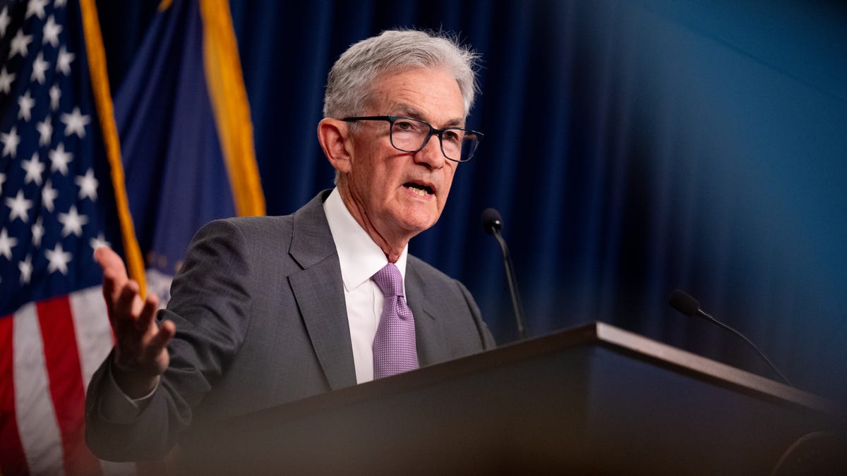 The Dow jumps 400 points as Jerome Powell says 'the time has come' for new Fed policy