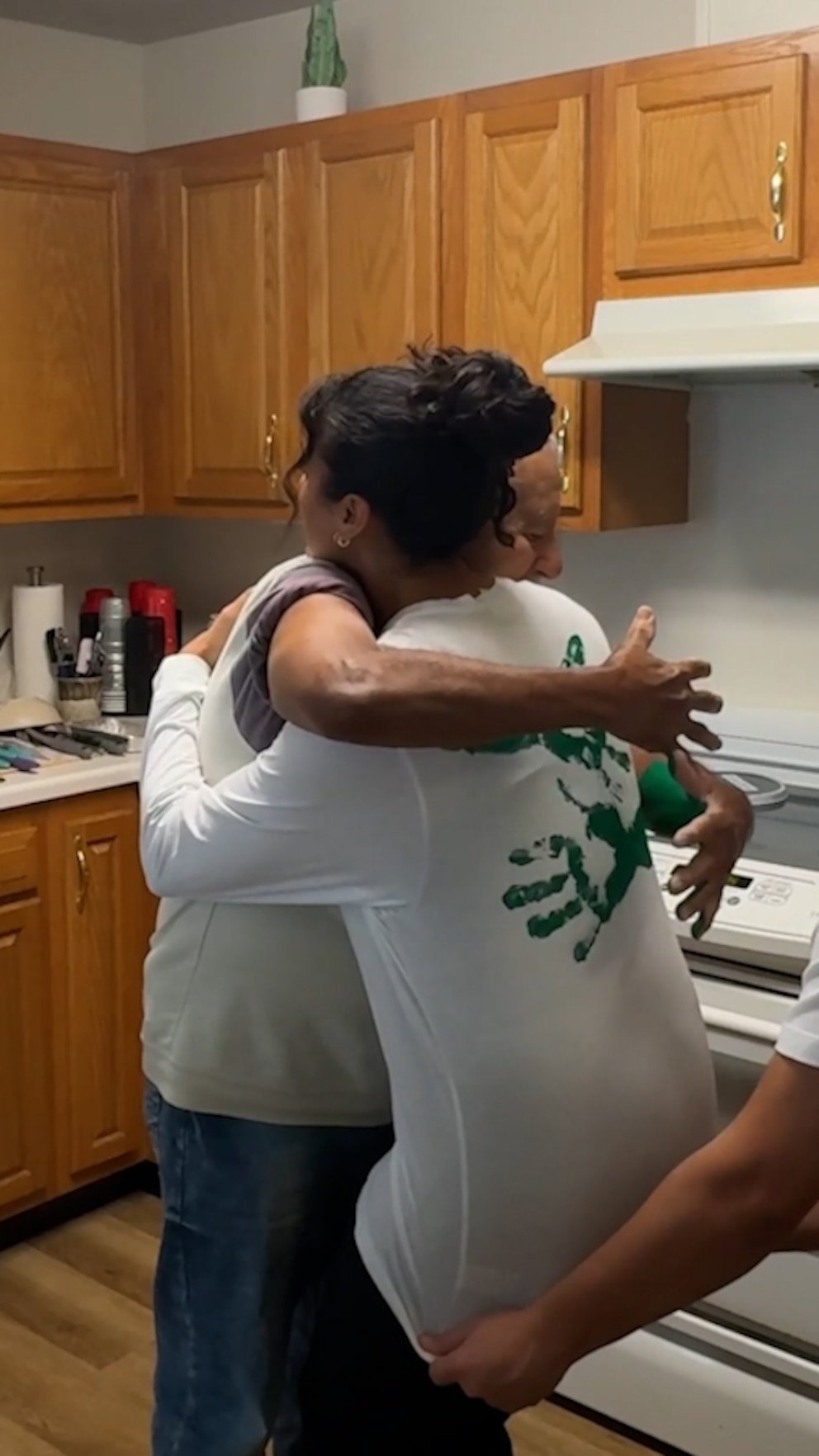 WATCH: Family paints grandpa's arms to imprint on shirts, immortalize his hugs