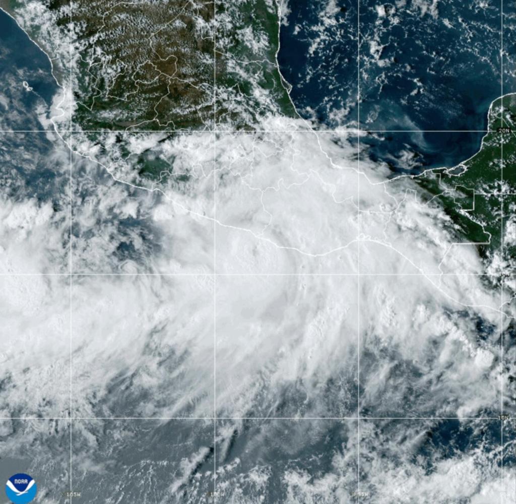 Hurricane John dissipates into a tropical depression