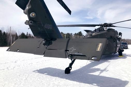 Snowmobiler who crashed into a parked helicopter is awarded $3 million