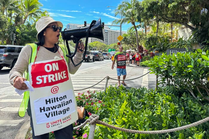 Union workers at Hawaii's largest hotel go on strike