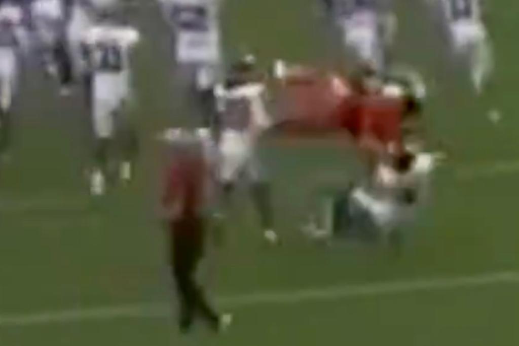 Auburn cheerleader wipes out Oklahoma player with wild backflip