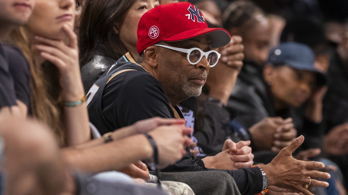 Basketball super fan Spike Lee takes in Liberty playoff game donning a Sabrina Ionescu jersey