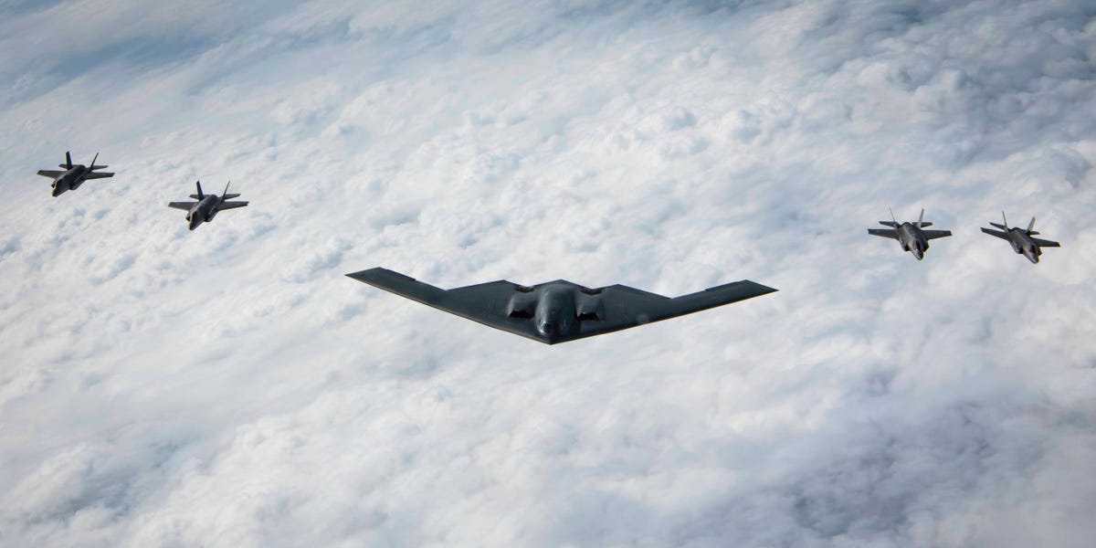 Photos show a US Air Force B-2 Spirit bomber flying with Japanese F-35s for the first time