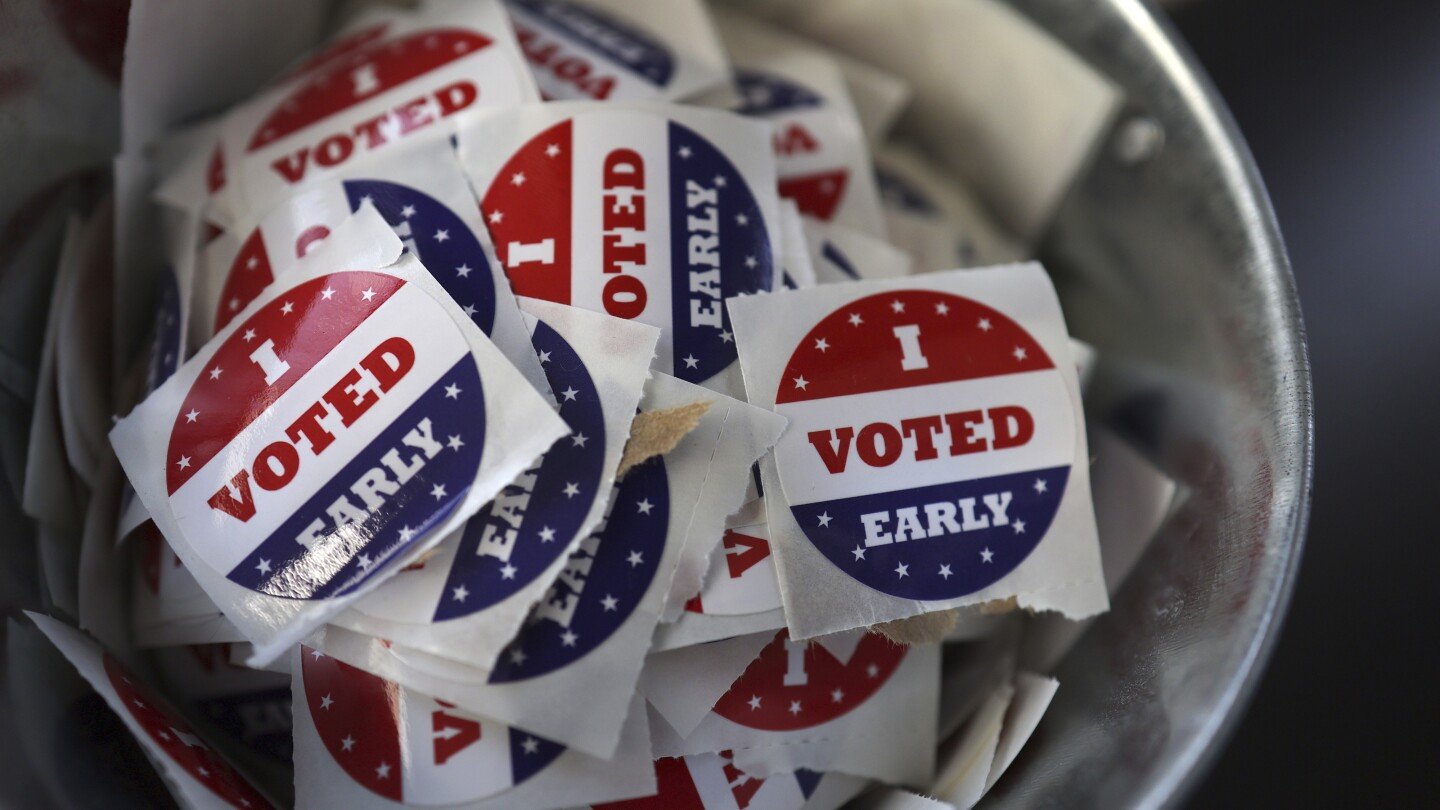 In-person voting begins for the US presidential contest, kicking off the sprint to Election Day