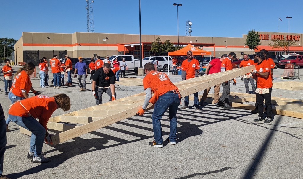 Home Depot Habitat volunteers aid veteran with start of a new home