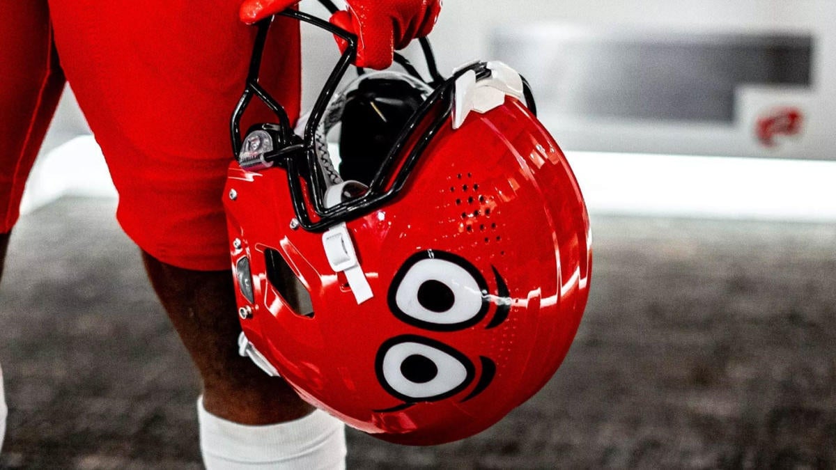 LOOK: Western Kentucky unveils Big Red inspired uniforms, including an incredible helmet with eyes