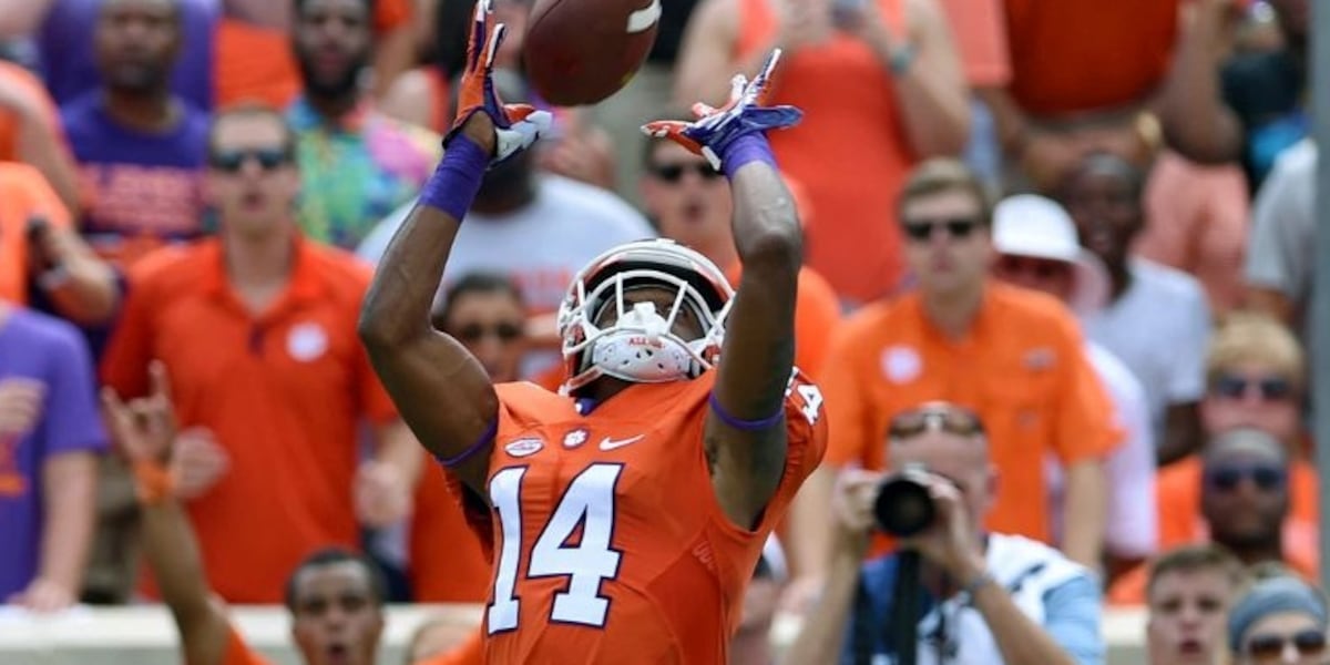 Man arrested in Michigan and charged with slaying of former Clemson receiver in North Carolina