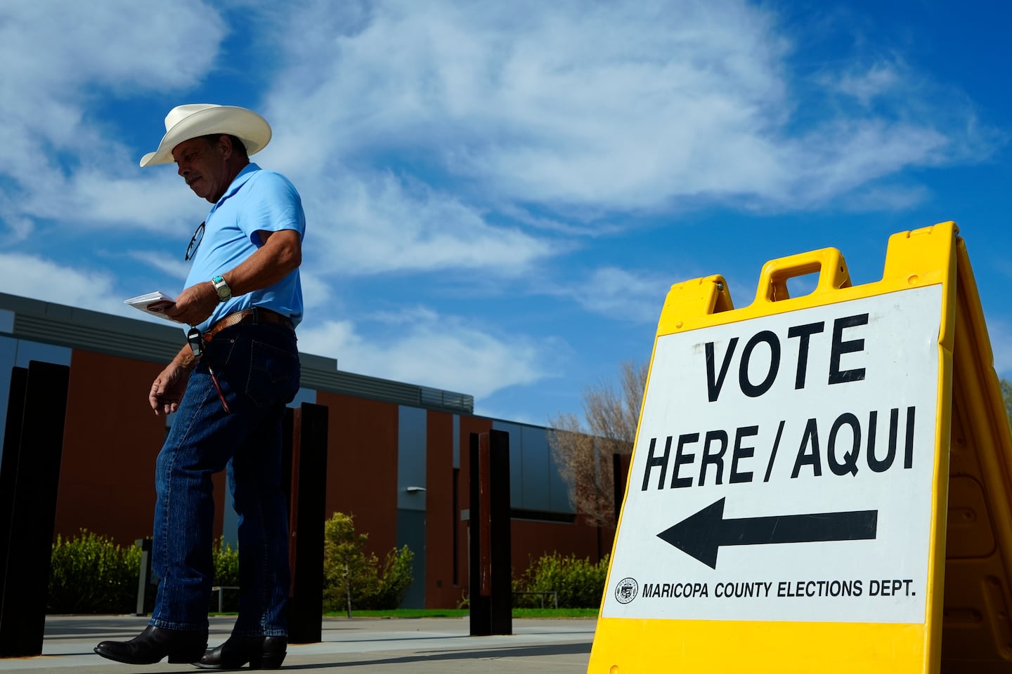 Early in-person voting begins in Arizona, drawing visits from the presidential campaigns