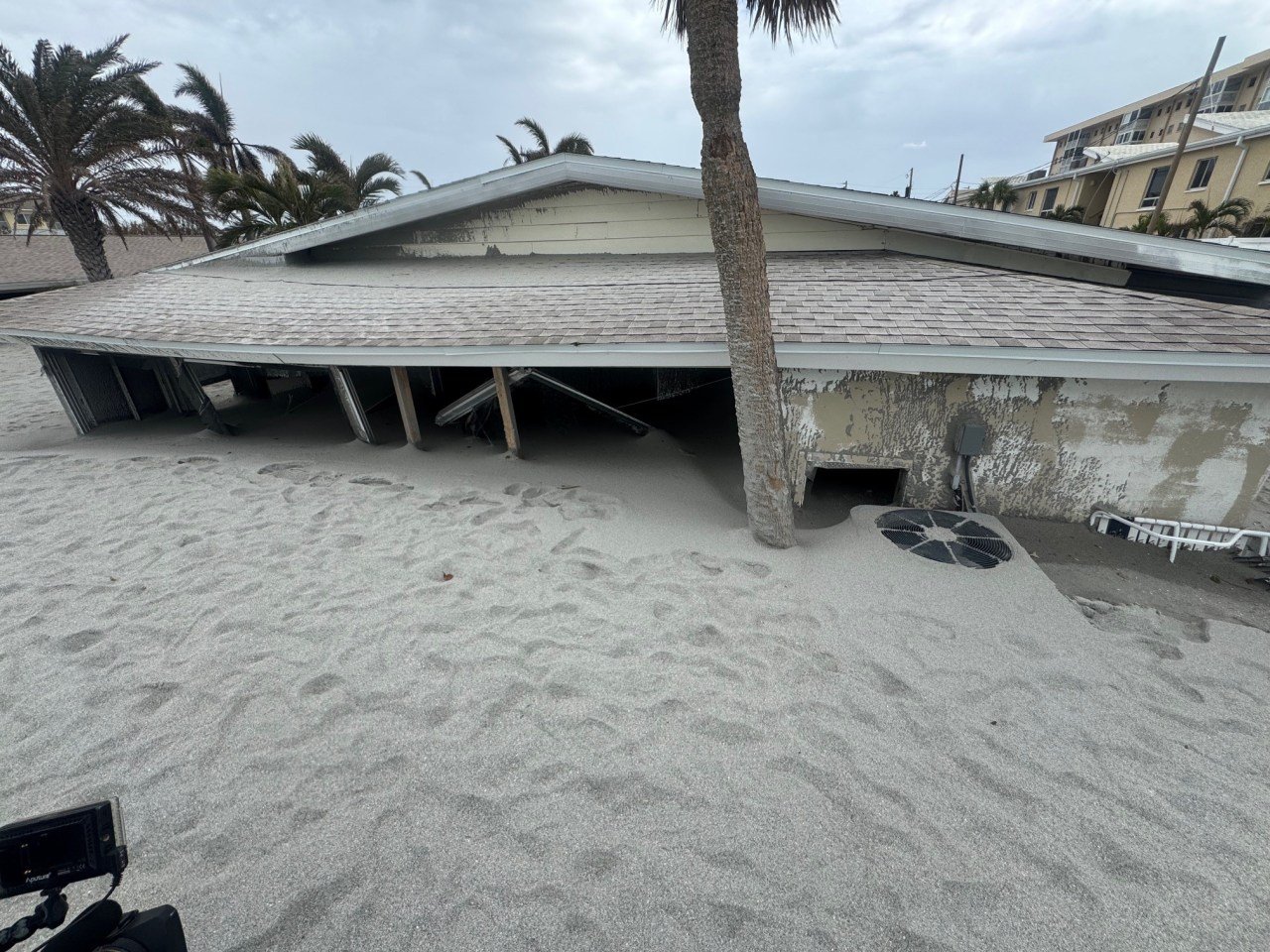 Florida home buried in sand after Milton