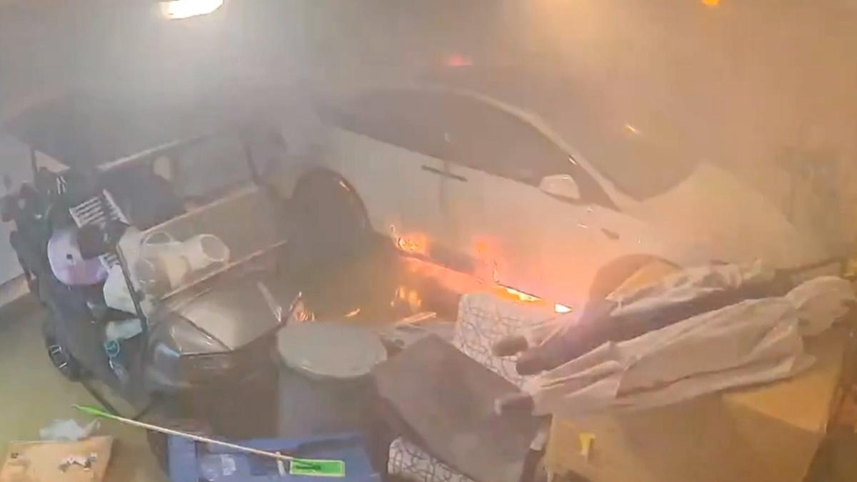 Video captures Tesla vehicle bursting into flames as Hurricane Helene floods Florida garage