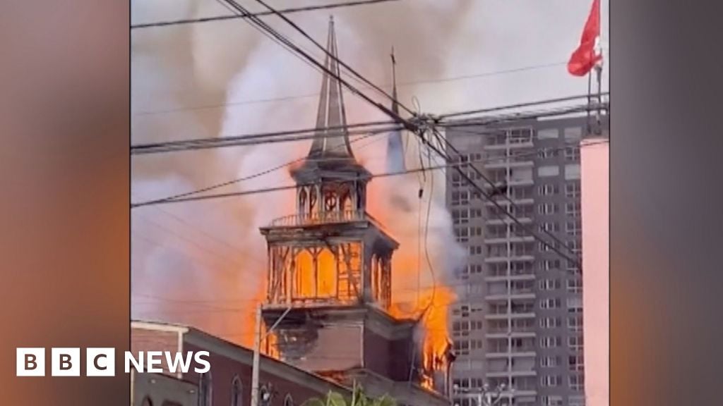 Watch: Tower falls as historic church destroyed by fire