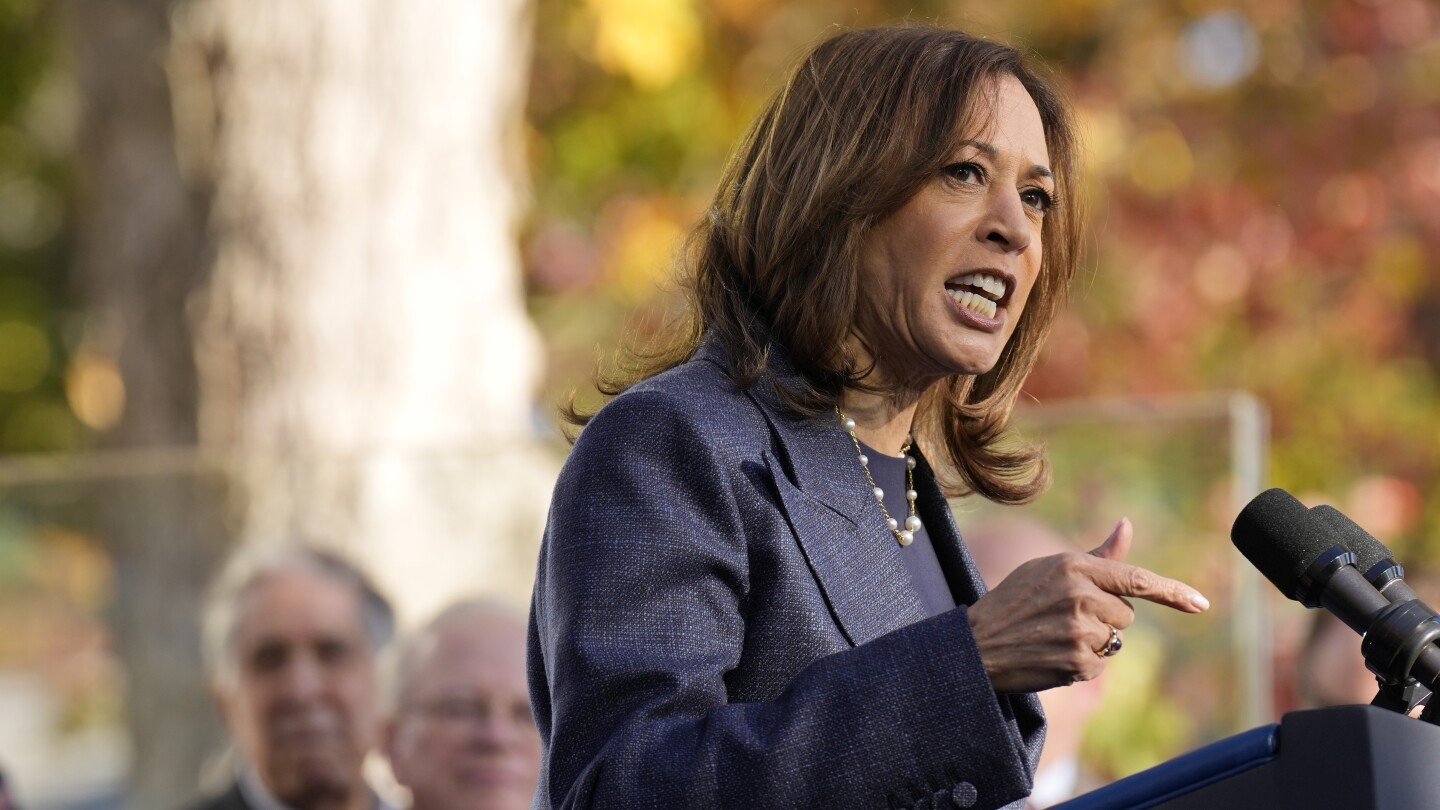 The Latest: Harris keeps a focus on 'blue wall' states in the campaign's final weeks